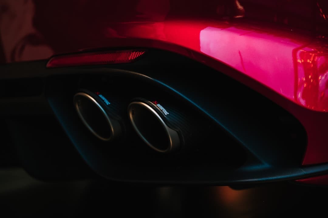 Close-up of a car's dual exhaust pipes